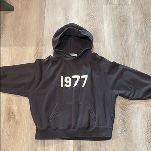 Essentials Charcoal Hoodie with 1977 Design